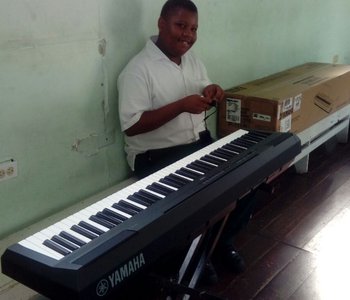 Ok the Keyboard donated by  Prof. Rajendra Ramlogan is ready for action